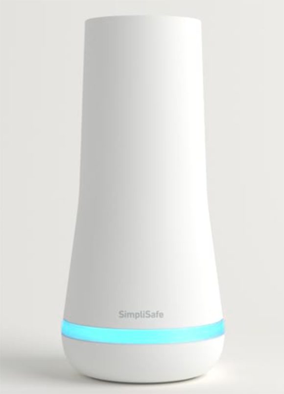 Photo of a tall vase-shaped electronic hardware all in white plastic, with a light blue band encircling about an inch from the bottom, that lights up. It bears text in grey sans serif lettering just above the blue band, reading SimpliSafe.