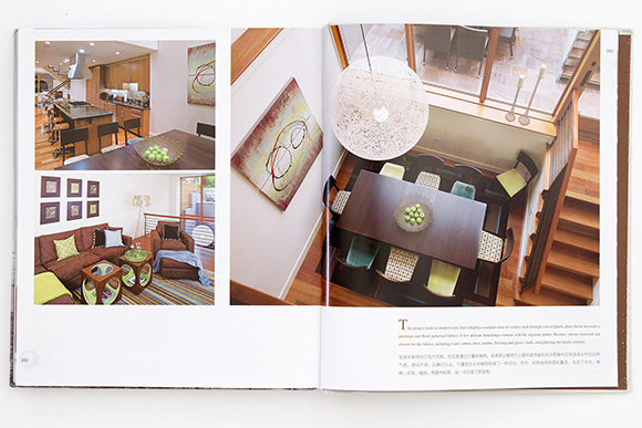 2-page book spread, showing a dining area from above, an open-plan kitchen, and a loft seating area, all in coordinated browns, lime greens, and turquoise blues, with warm wood tones.