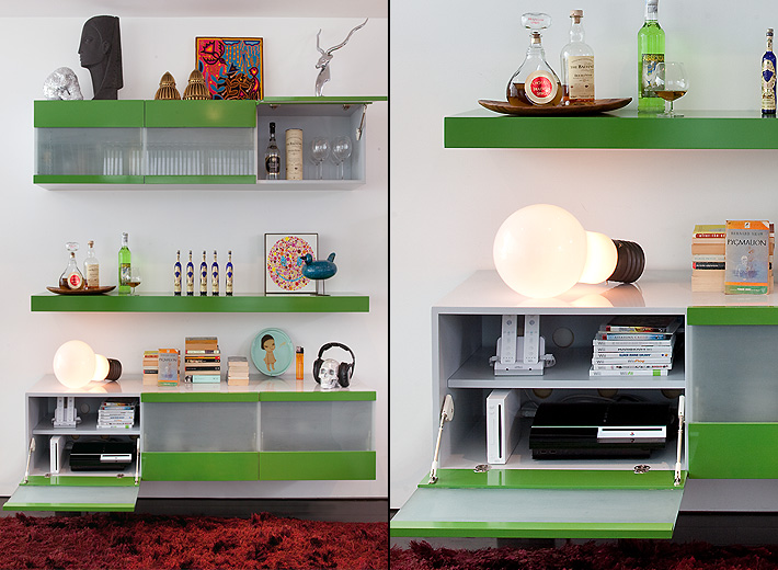 Contemporary media cabinet is painted in green lacquer with bar shelving for preparing cocktails, and enclosed storage for multimedia components