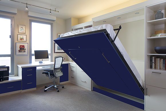 View of a San Francisco condo home office space featuring a Queen-sized navy blue Murphy convertible bed in the partially open position with white sheets.
