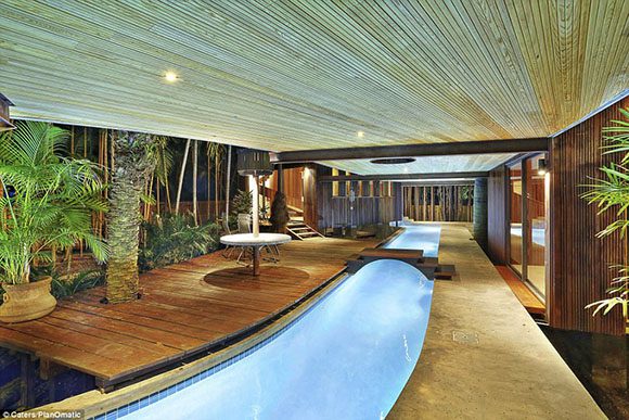 This architect's home features a lazy river connecting the three pavilions, so you could swim between bedroom, living room, and dining room, or just take the footbridge if you want to stay dry.