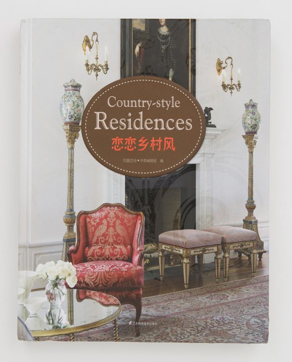 Photo of the hardcover book Country-Style Residences, in Chinese and English.