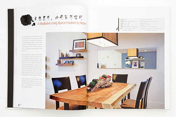 Photo of an open book showing 2-page spread of a dining room space with live edge wood table and modern dark wood chairs.
